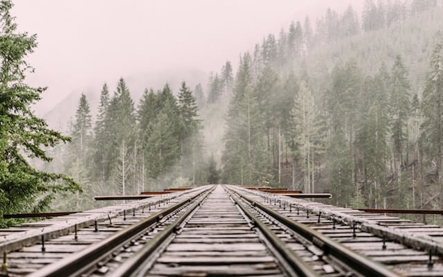 Picture of railroad tracks signifying when deciding how to plan an event the importance of staying focused.
